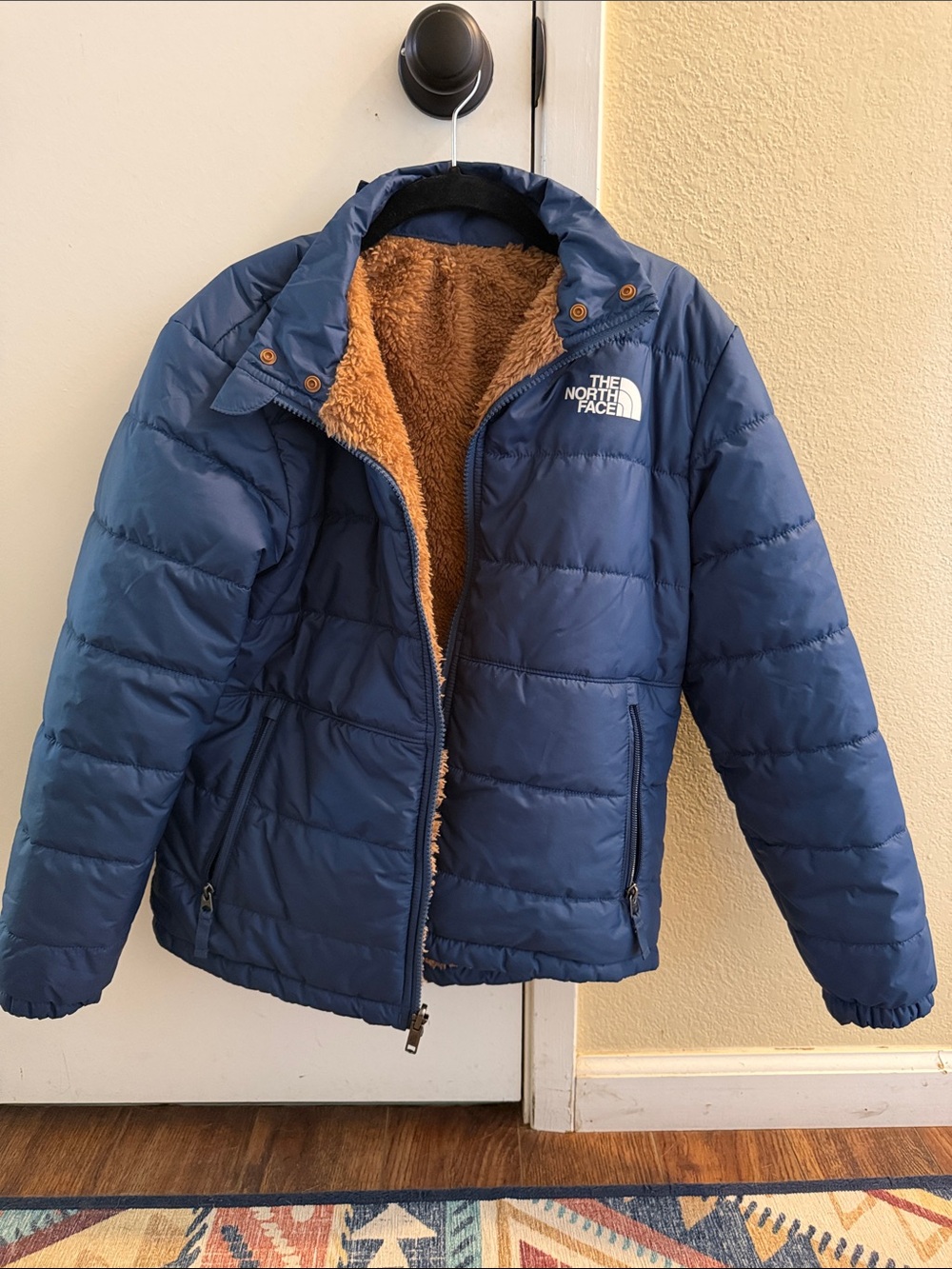 The North Face Blue Puffer Jacket with Brown Sherpa Lining